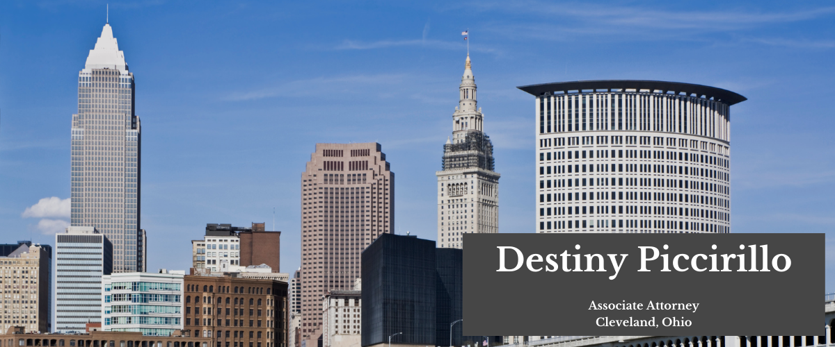 Image of downtown cleveland with text in a grey box reading destiny piccirillo associate attorney cleveland ohio